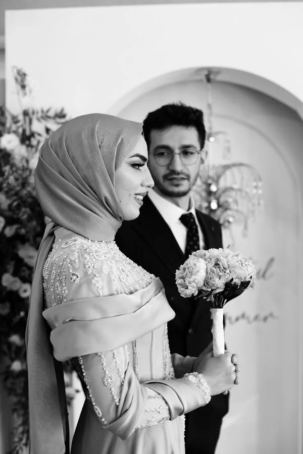 muslim couple black and white photo
